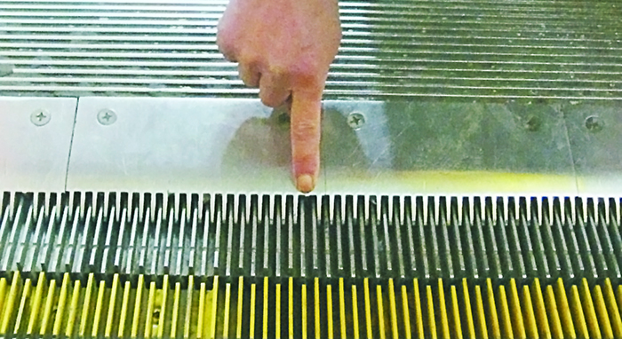 What is the Escalator (Moving Walk) Comb Plate